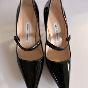 Those are one of a kind black patent leather pumps. They are super comfortable.